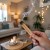 palo-santo-stick-in-hand--burning--smoking--living.jpg